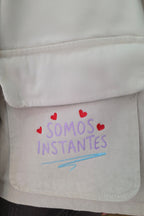 CHAQUETA CROP SOMOS INSTANTES